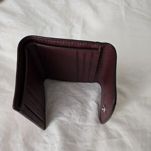 Never used pink Coach wallet